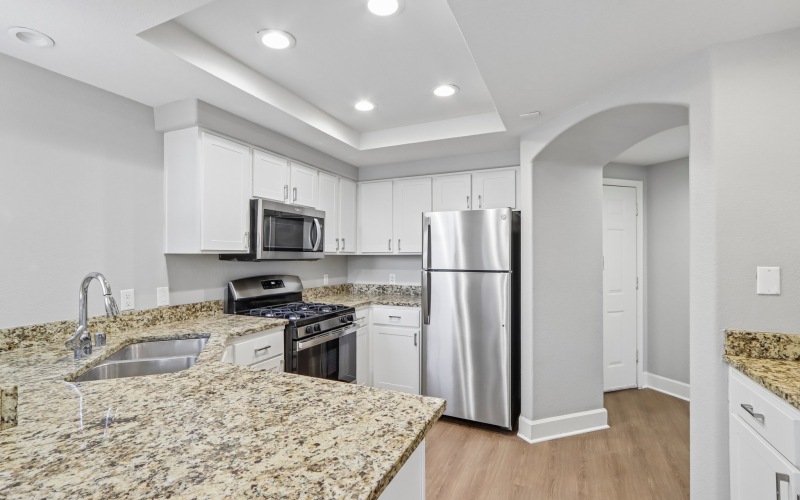 kitchen with stainless appliances and granite countertops
