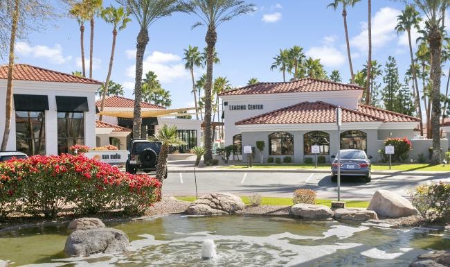 a building with a fountain in front
