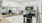 a kitchen with white cabinets