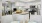 a kitchen with white cabinets