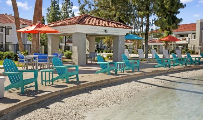 a group of tables and chairs outside
