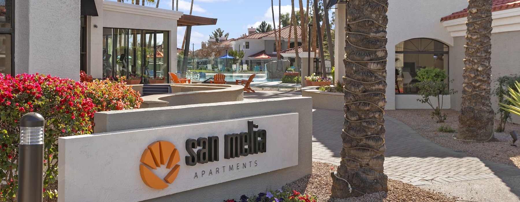 a sign in front of a building