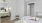a bedroom with a large mirror