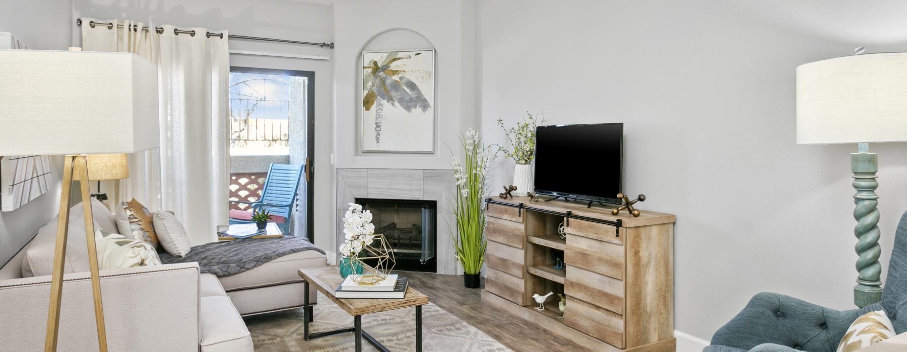 a living room with a fireplace